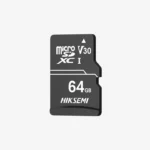 HIKSEMI DE1 64GB Class 10 V30 MicroSDXC memory card placed next to a smart home Wi-Fi security camera, highlighting continuous video storage.