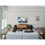 Sony HT-G700 3.1ch Dolby Atmos soundbar with wireless subwoofer positioned in front of a flat-screen TV in a home theater setting
