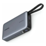 UGREEN 20000mAh 67W power bank PB550 featuring its integrated Type-C cable connected to a laptop for fast charging.