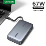 UGREEN 20000mAh 67W power bank PB550 featuring its integrated Type-C cable connected to a laptop for fast charging.