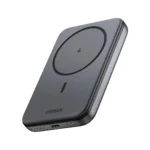 UGREEN PB561 10000mAh magnetic wireless power bank in Space Gray magnetically attached to the back of an iPhone charging wirelessly.