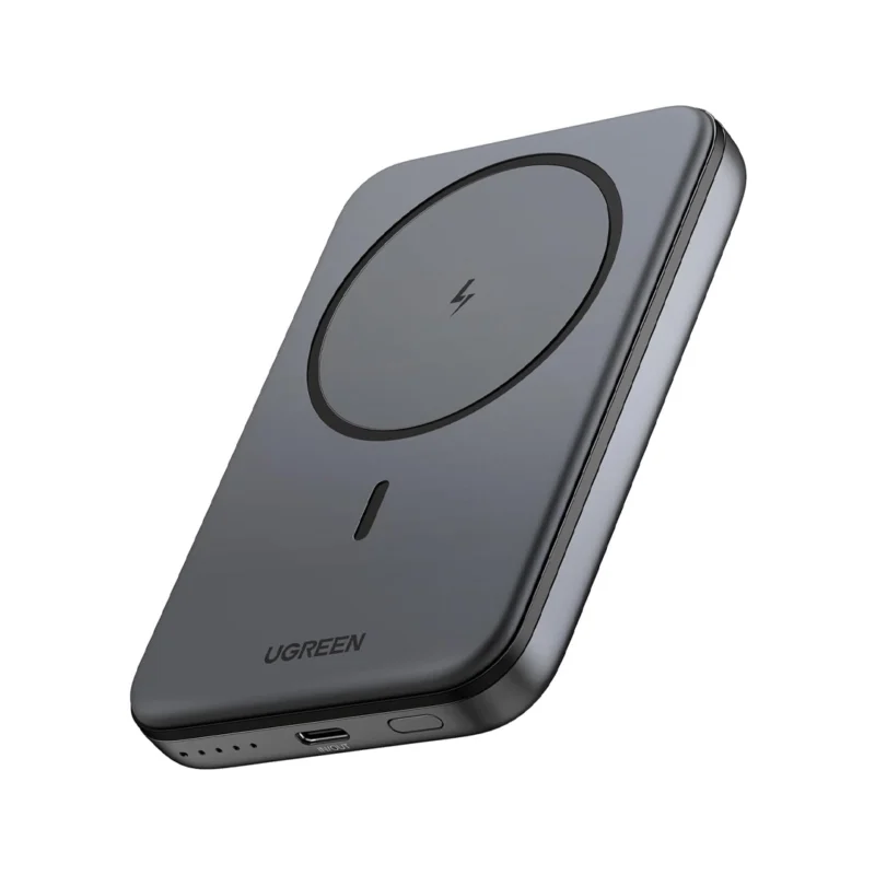 UGREEN PB561 10000mAh magnetic wireless power bank in Space Gray magnetically attached to the back of an iPhone charging wirelessly.