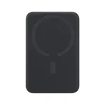 Baseus EnerFill FM11 10000mAh ultra-mini magnetic power bank snapped onto the back of a smartphone, showing its compact size and wireless charging capability.