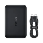 Baseus EnerFill FM11 10000mAh ultra-mini magnetic power bank snapped onto the back of a smartphone, showing its compact size and wireless charging capability.