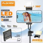Plokama LIVE K5 2-in-1 LED selfie stick extended as a tripod stand with a smartphone mounted and built-in LED fill light illuminated.