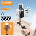 Plokama LIVE K5 2-in-1 LED selfie stick extended as a tripod stand with a smartphone mounted and built-in LED fill light illuminated.