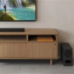 Sony BRAVIA Theater Bar 5 HT-B500 3.1 channel soundbar placed under a TV screen alongside its matching wireless subwoofer.